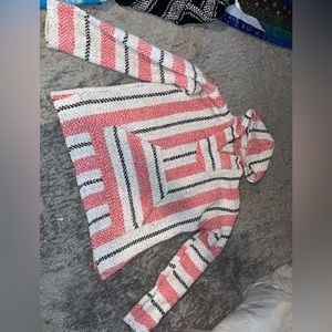 Medium salmon, grey and black Baja Jacket.